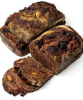 Loaves of dark brown chocolate bread with almonds